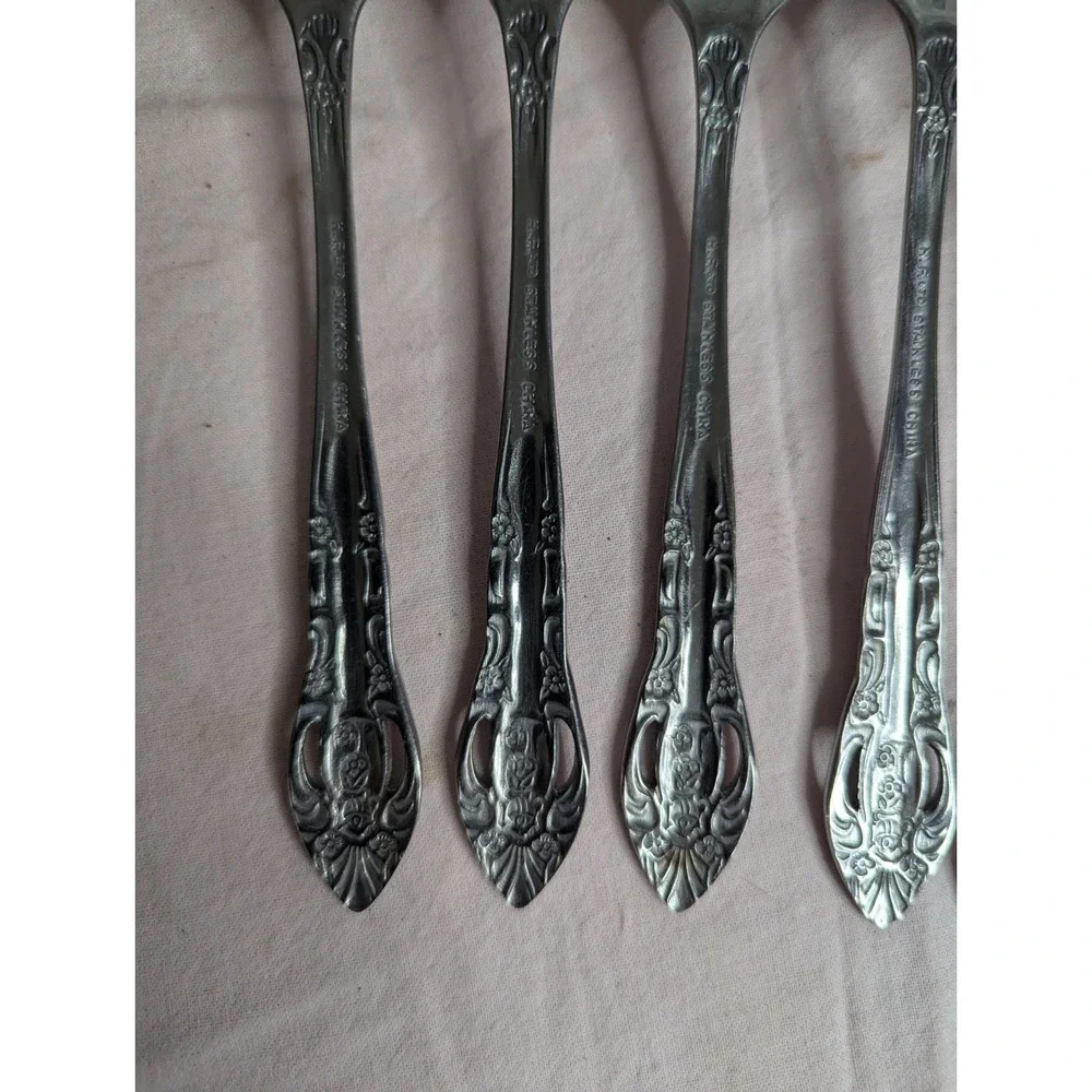7 lot H.F. LTD Stainless stamped flower pattern 7